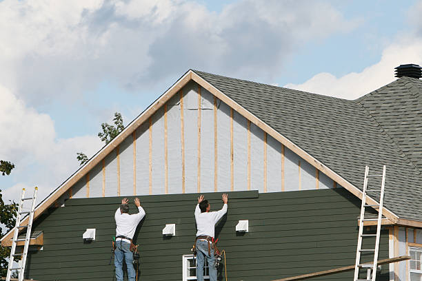 Professional Storm Damage Siding Repair technician working in Chesapeake, OH